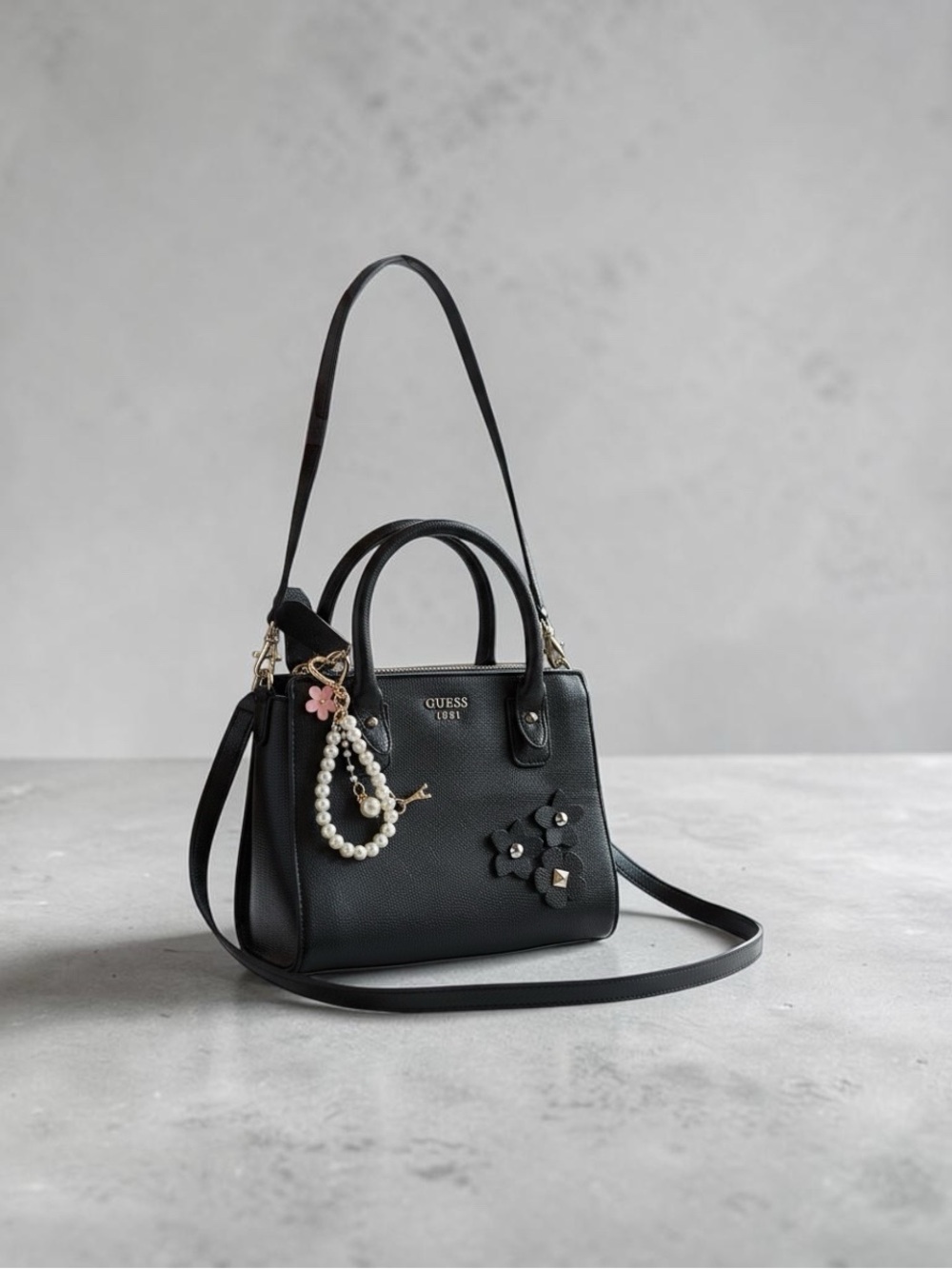 GUESS Black Leather Satchel with Pearl and Floral Charms